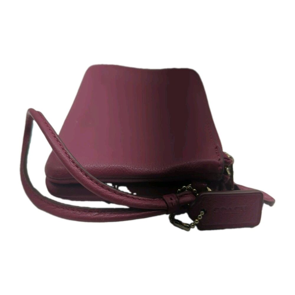 Coach Raspberry Wristlet in "Great Condition" Lightly Used.